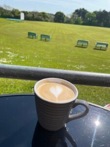 photo of a cup of coffee at the Pavilion - the views over the cricket pitch