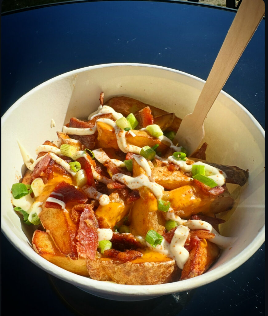 A photo of loaded chips. There's something new every day! Pop in and see what’s cooking